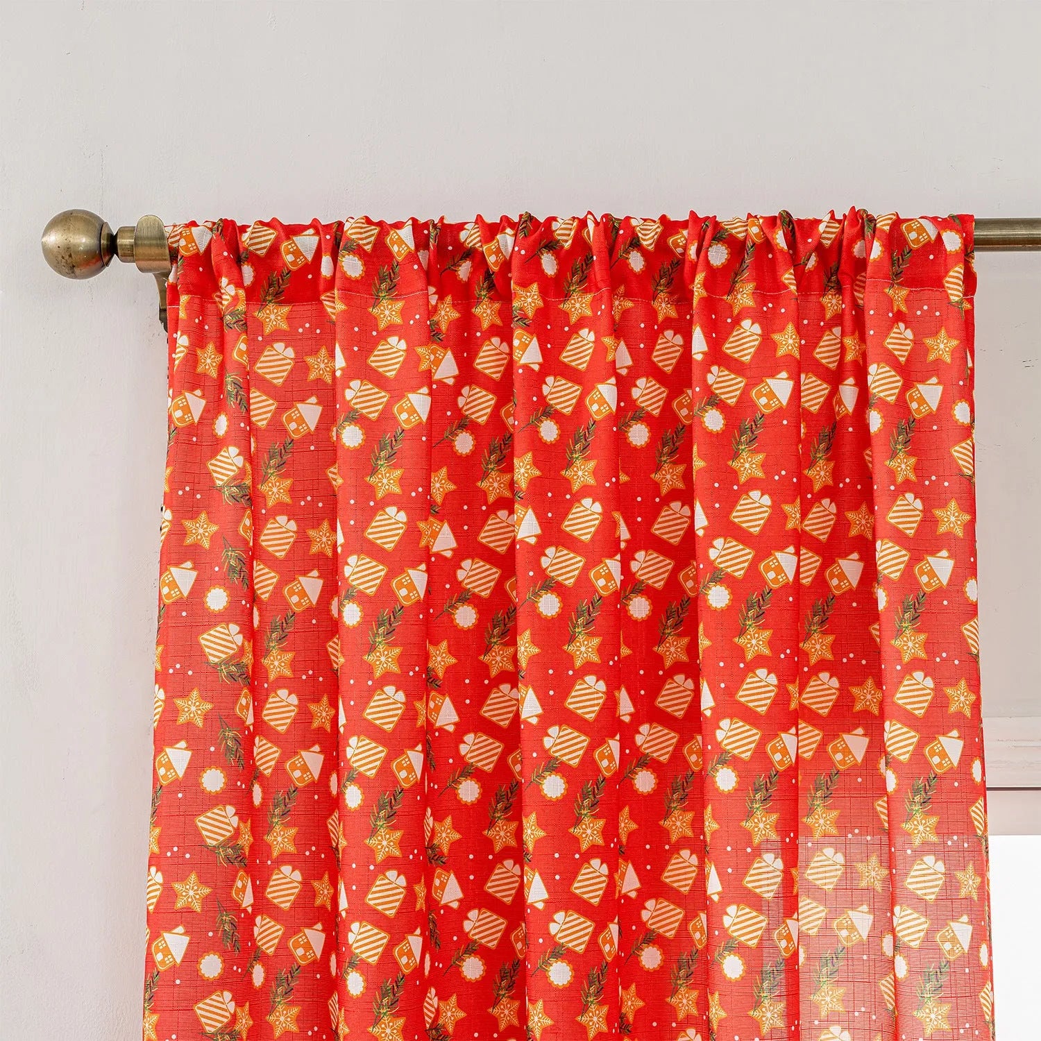 Green Christmas curtain with printed snowman and angel cartoon pattern, one metre wide.
