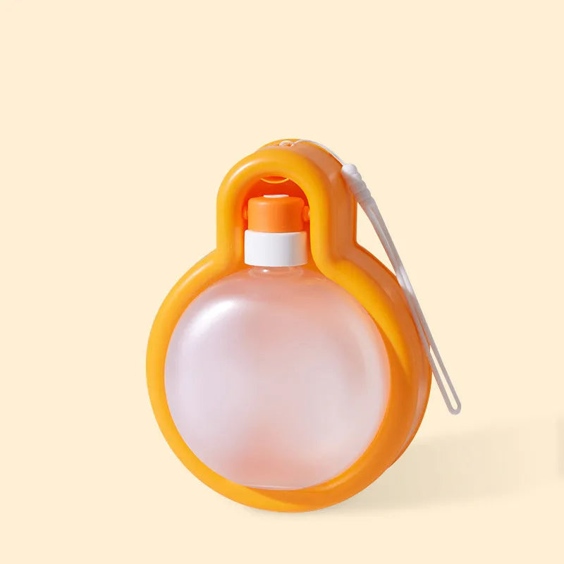 Green portable pet travel water bottle with pull-out drinking bowl for dogs