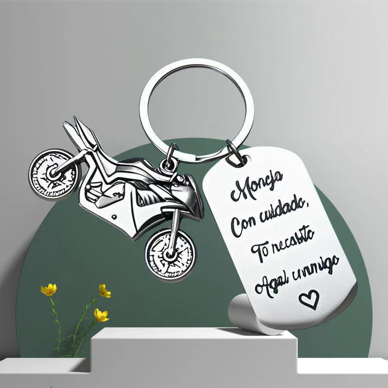 Stainless steel motorcycle keychain with modern simplicity design and velvet cloth packaging