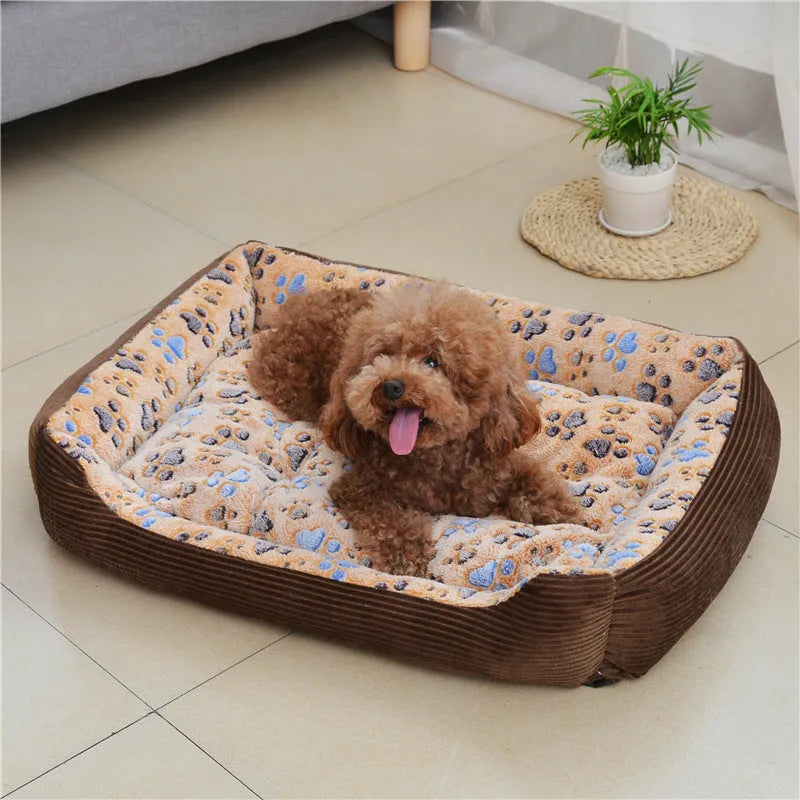 Plush sofa-style dog bed with raised sides in beige colour for small dogs