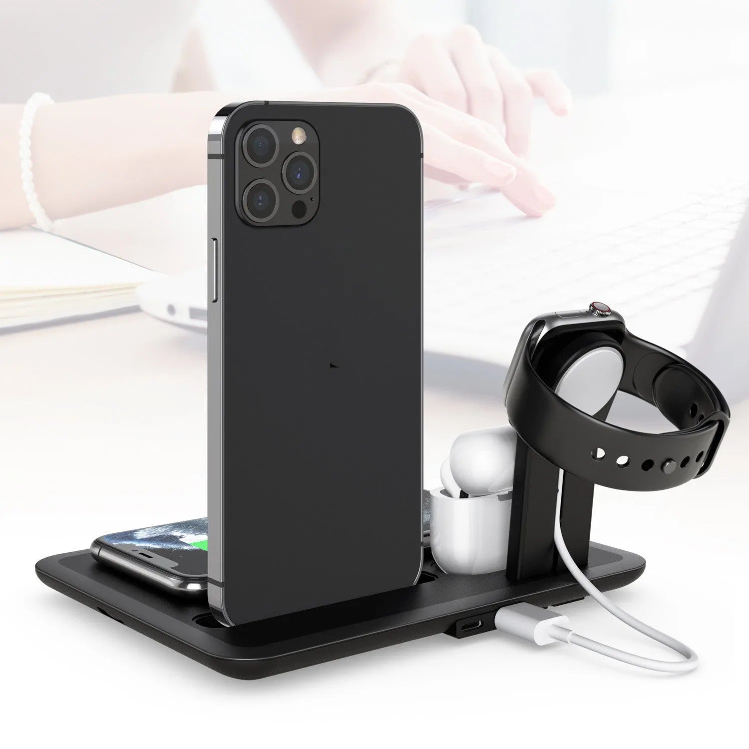 Black and white desktop wireless charging station for phone watch headphones with USB ports