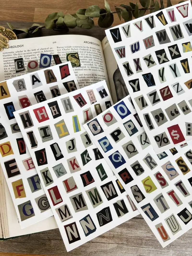 English letters and numbers symbol label stickers showing colour-coded letter sets A through E with weekly words