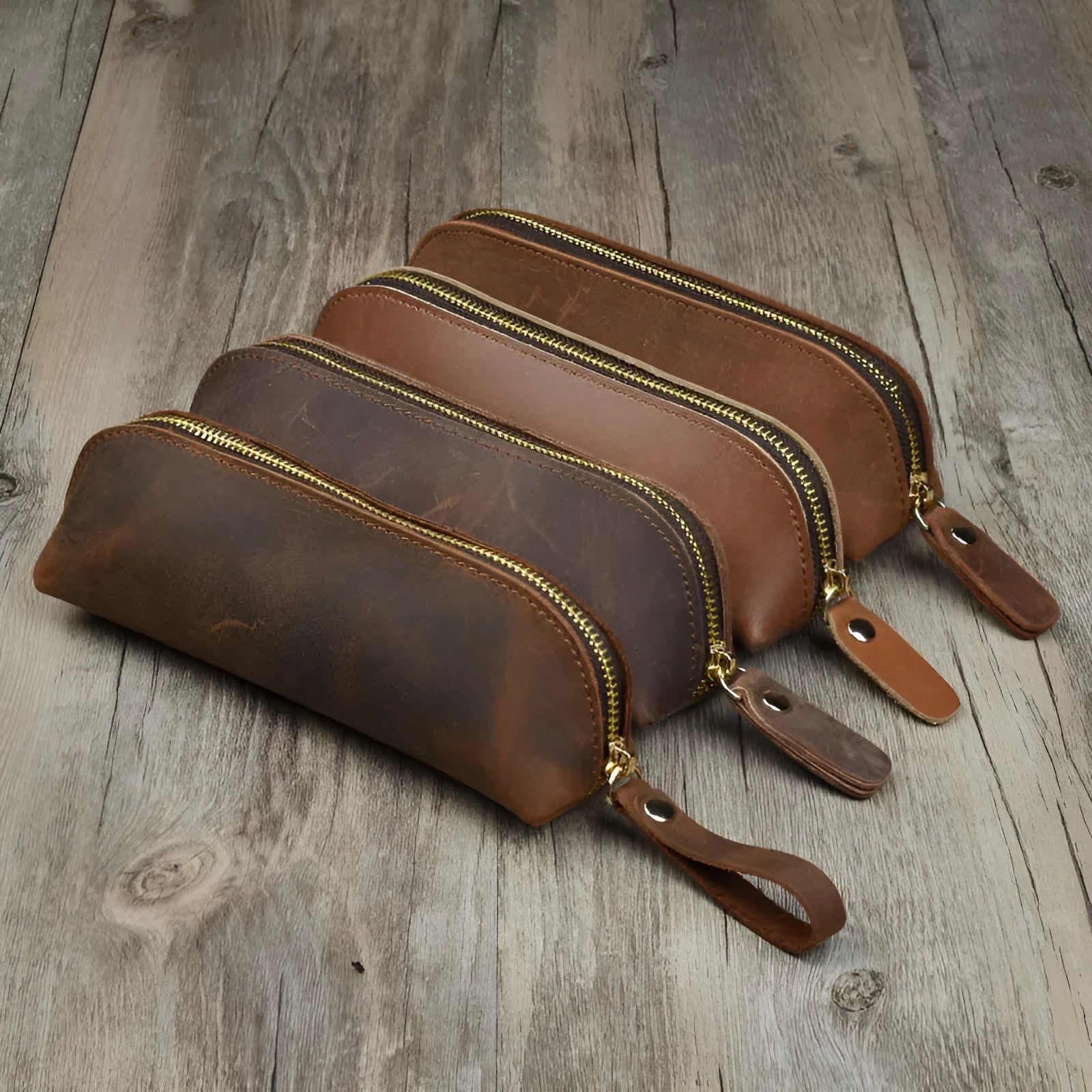 Genuine cowhide leather pencil case in square design with zipper closure measuring 18cm