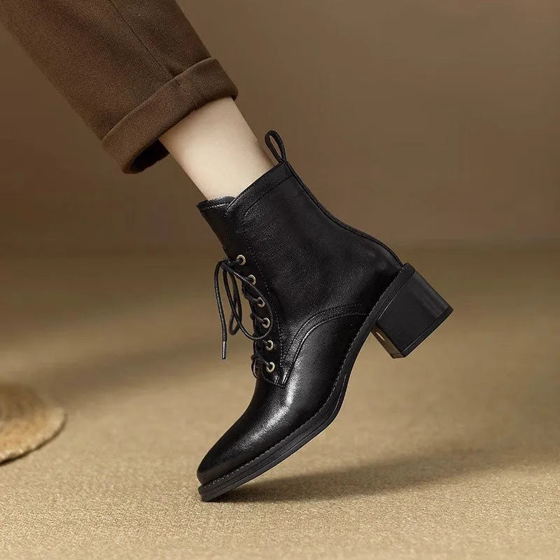 Women's black pointed-toe ankle boots with 5.5cm heel and 13cm shaft height