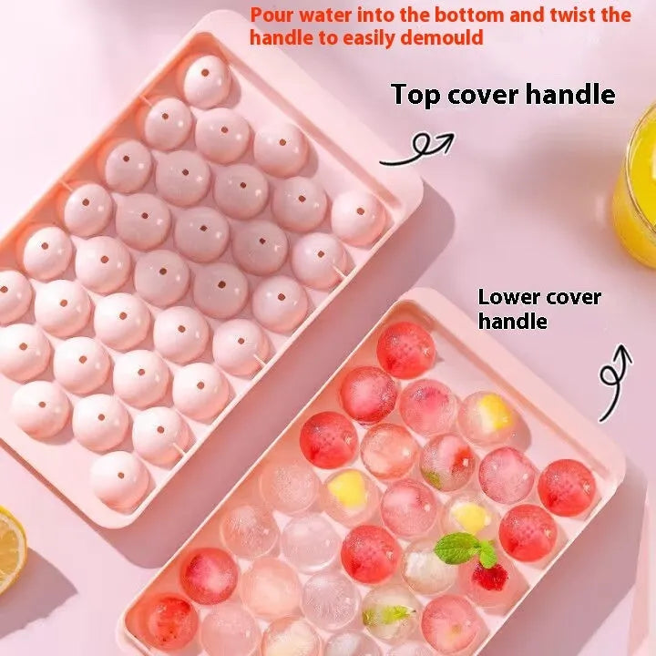 Blue silicone ice cube tray with lid showing 33 round ice cube moulds