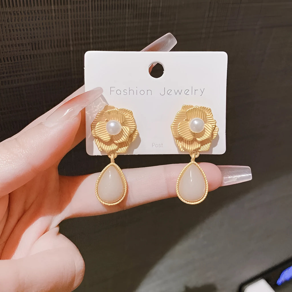 Gold alloy opal flower stud earrings with needle rose and pearl design Hong Kong style