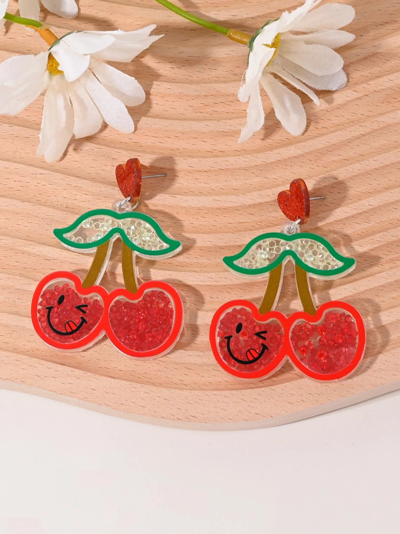 Colourful acrylic fruit earrings for women featuring cherry, strawberry, watermelon, and pineapple shapes, dangle style
