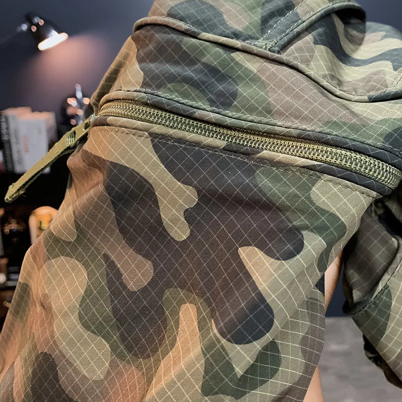 Man wearing loose-fit camouflage cargo shorts made from a cotton blend fabric.
