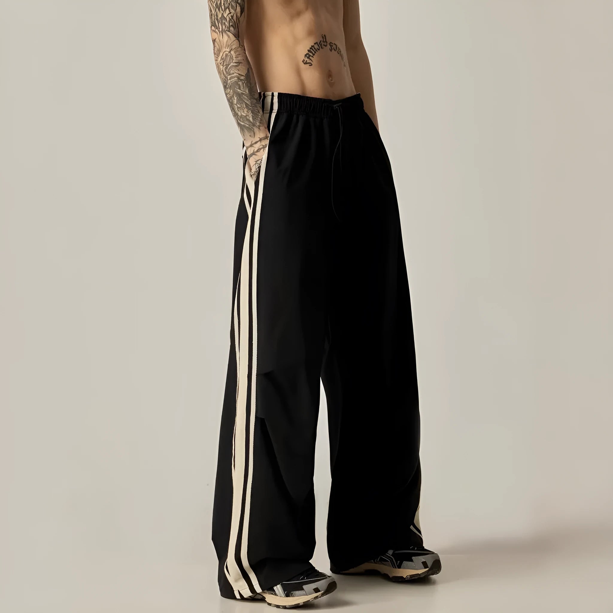 Men's black wide leg climbing pants with high waist and straight-leg design