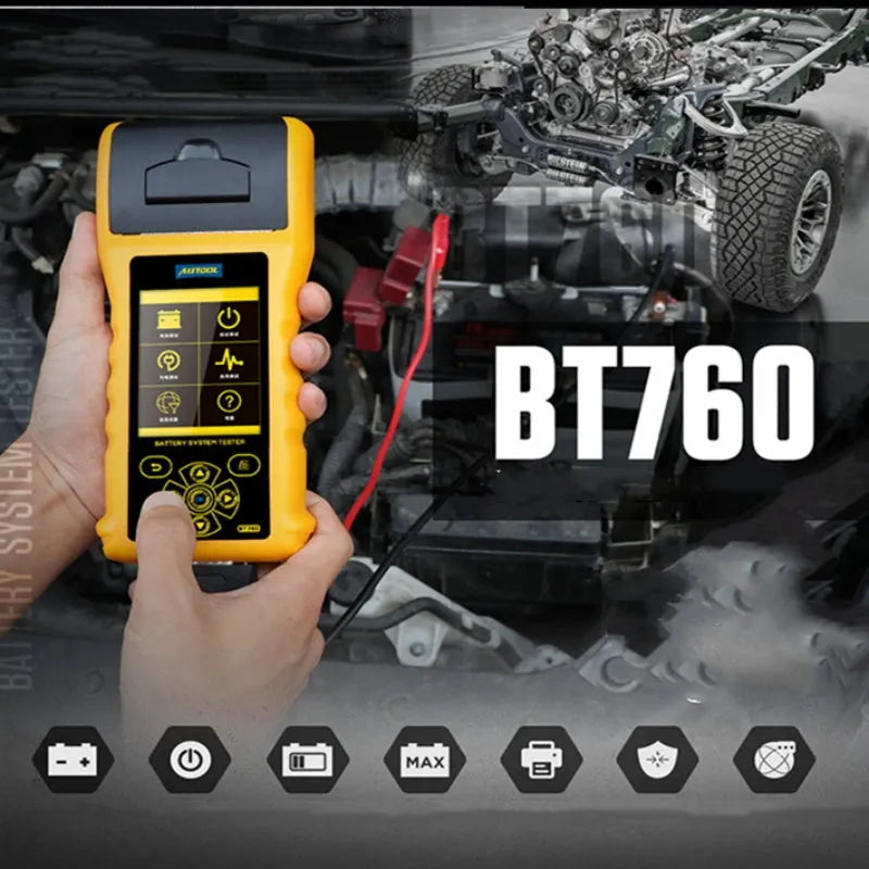Autool BT760 car battery tester with colour screen and attached battery clips on a workbench