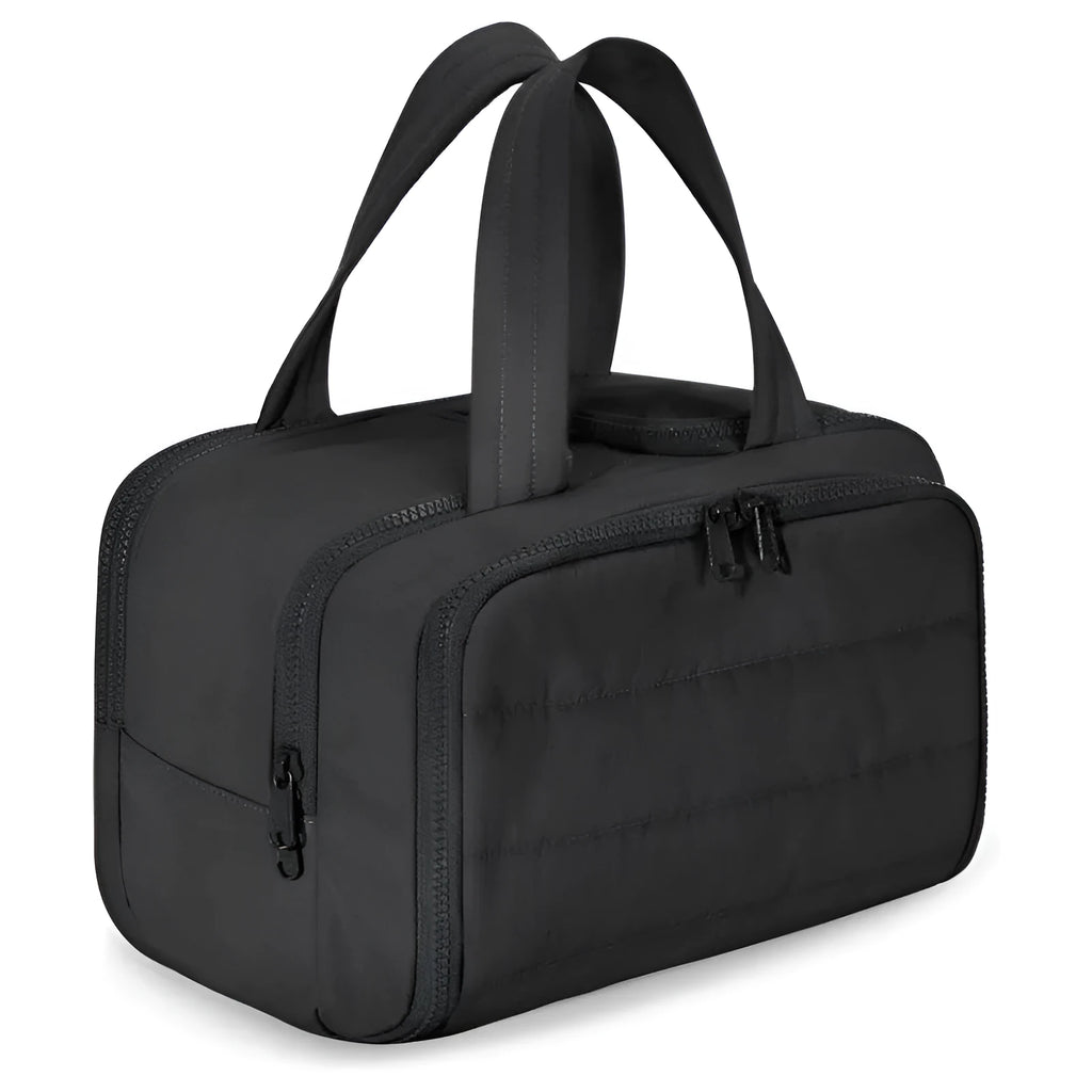 Large open travel toiletry bag in polyester fabric showing interior pocket and zip closure.