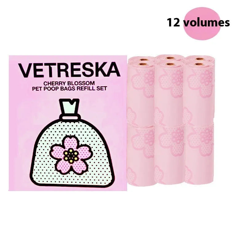 Dog poo bag dispenser capsule with scented inner bags in strawberry, orange and cherry blossom options