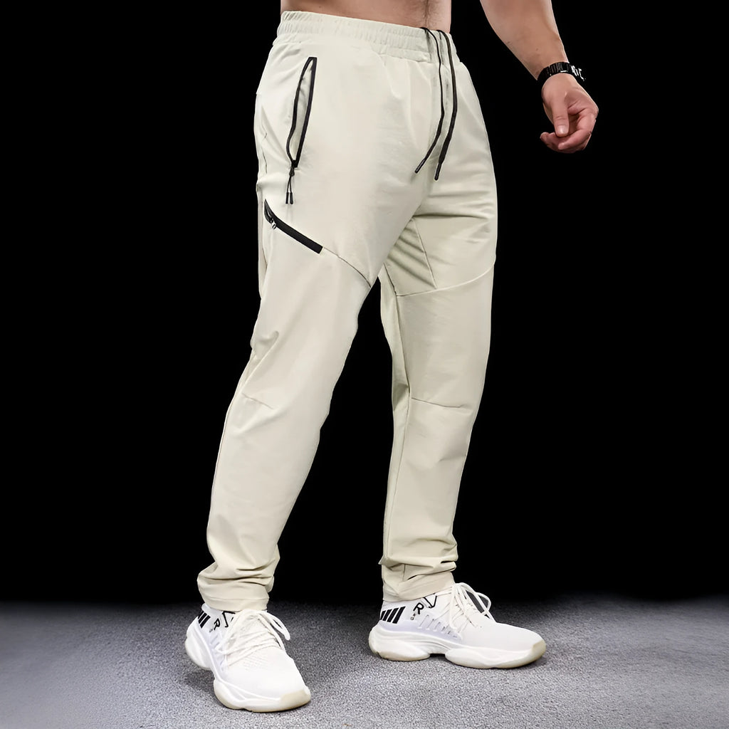 Men's waterproof quick-dry workout trousers in nylon fabric showing colour options