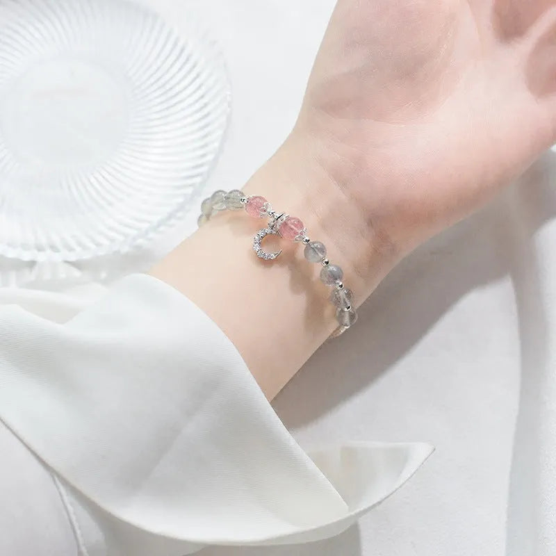 Handmade natural moonstone bracelet with crescent moon charm on adjustable chain