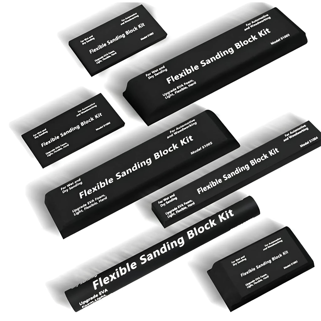 Set of seven black frosted metal alignment blocks for workshop use.