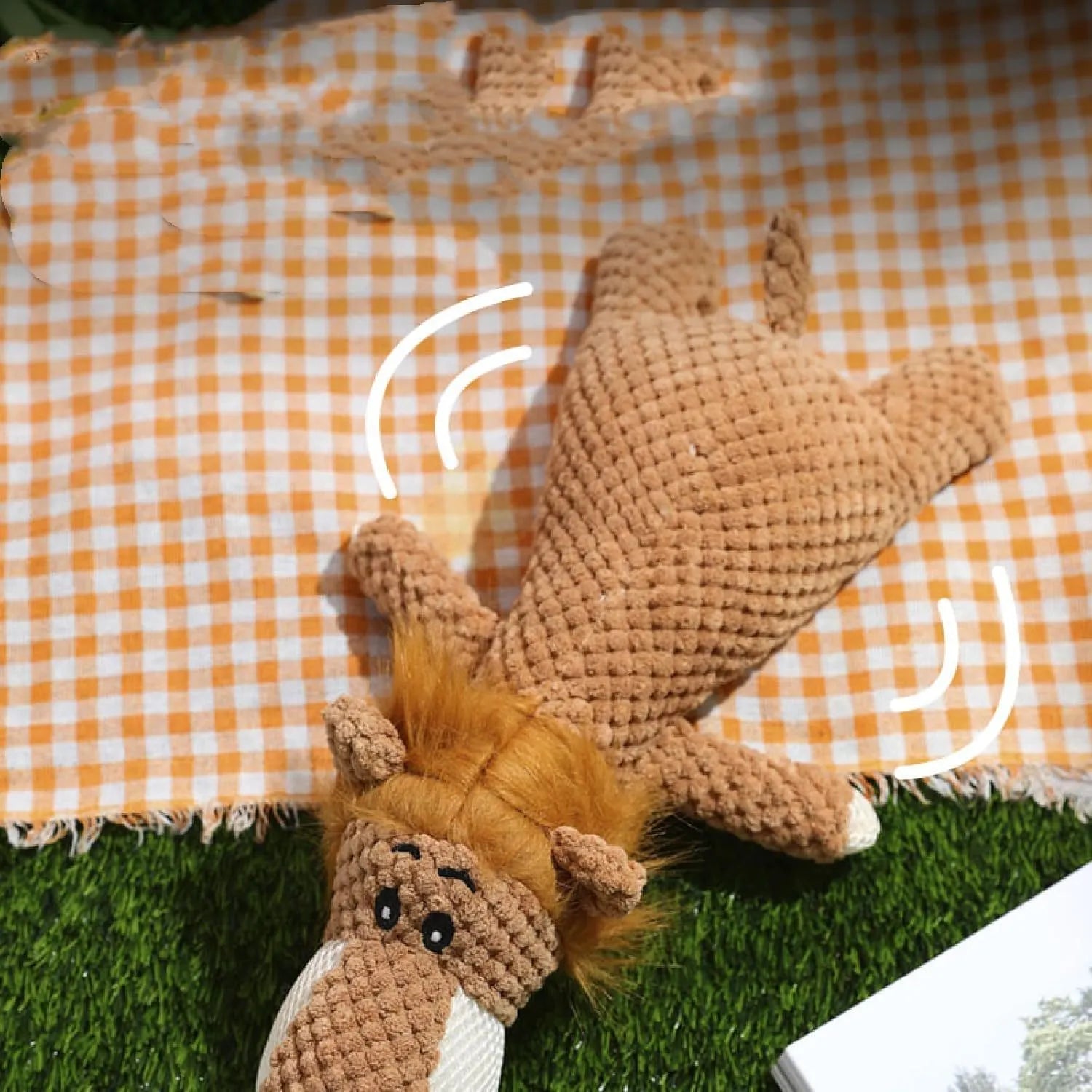Corn kernel shaped plush dog chew toy with animal designs and squeaker sound feature