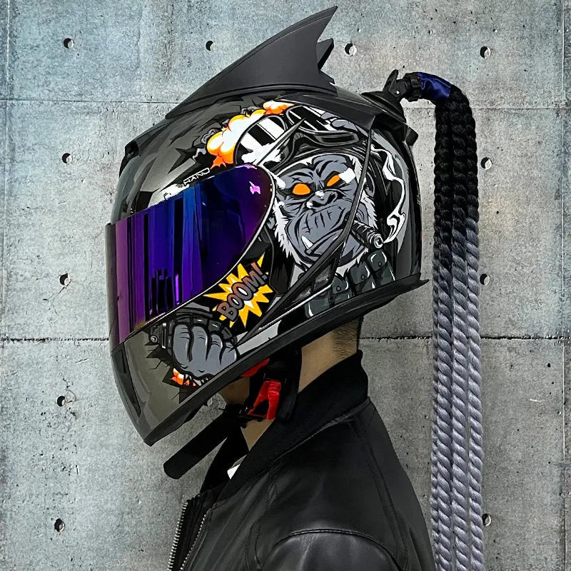 Full-face motorcycle helmet with colourful dirty braids graphic design on an ABS shell.