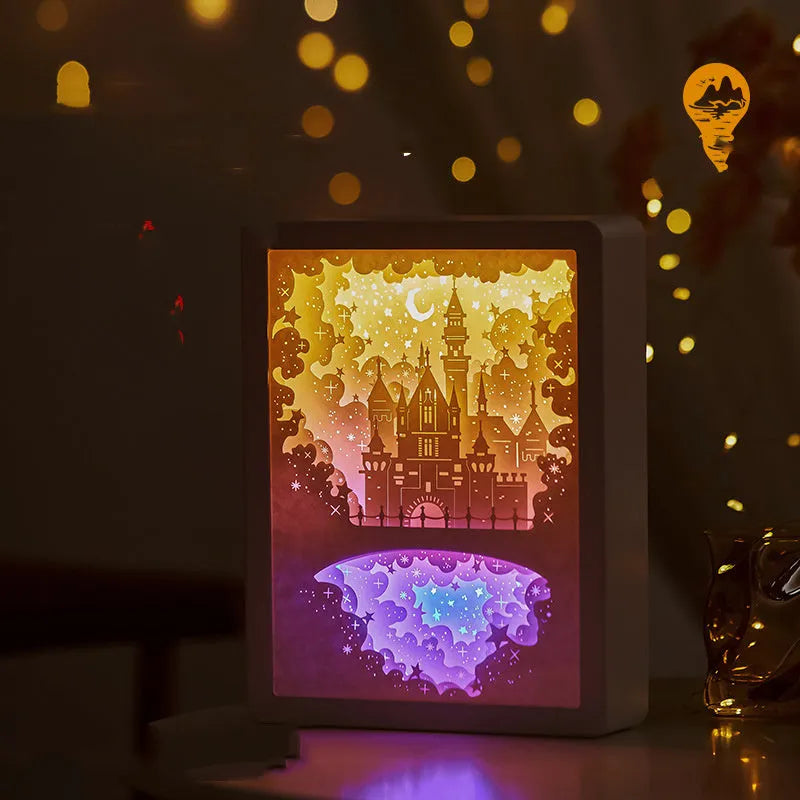 USB-powered bedside night light with three-dimensional paper carving design in yellow or purple light
