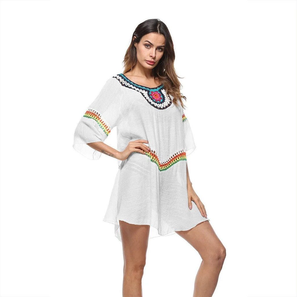 Crocheted ethnic style sun protection clothing for women in apricot, black, sapphire blue, or white.