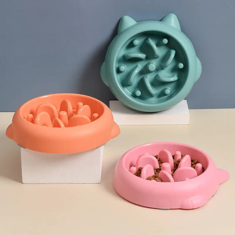 Green PP plastic slow feeder bowl for dogs with bone-shaped internal maze ridges.