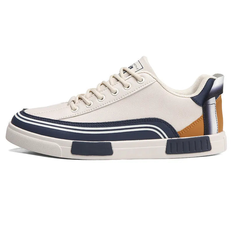 Men's beige and white and green canvas casual shoes with mesh sections and a round toe.