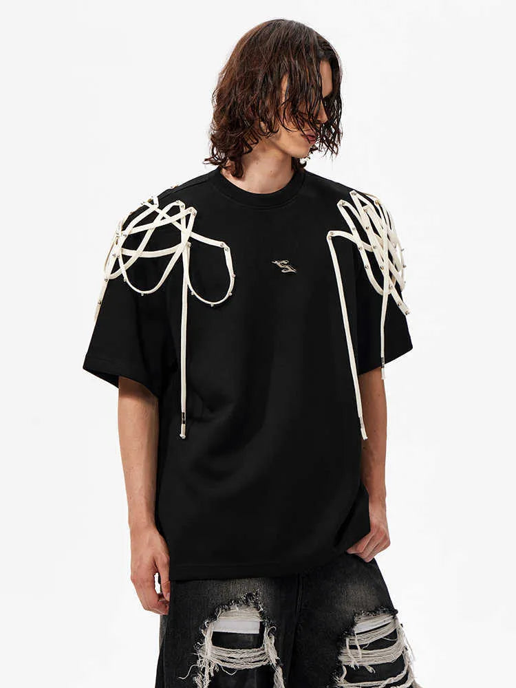 Black loose fit t-shirt with rivet ribbon padded shoulders and round neck collar