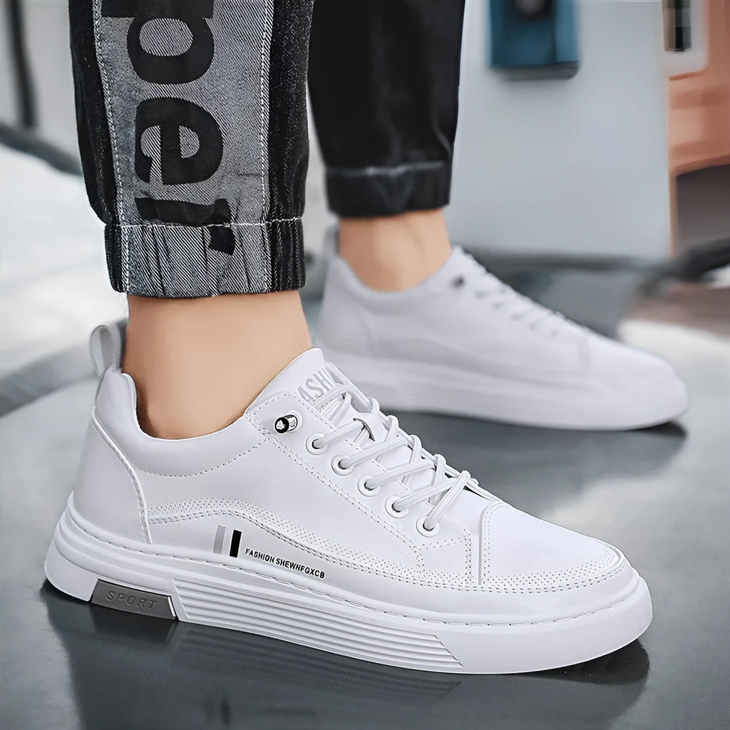 Men's low-top black and white skateboard shoes with elastic band closure and round toe.