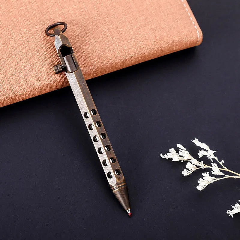 Hexagonal brass bolt action pen showing six-sided barrel and bolt mechanism