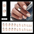 Black and white frosted gel manicure set with plastic nail armour pieces.