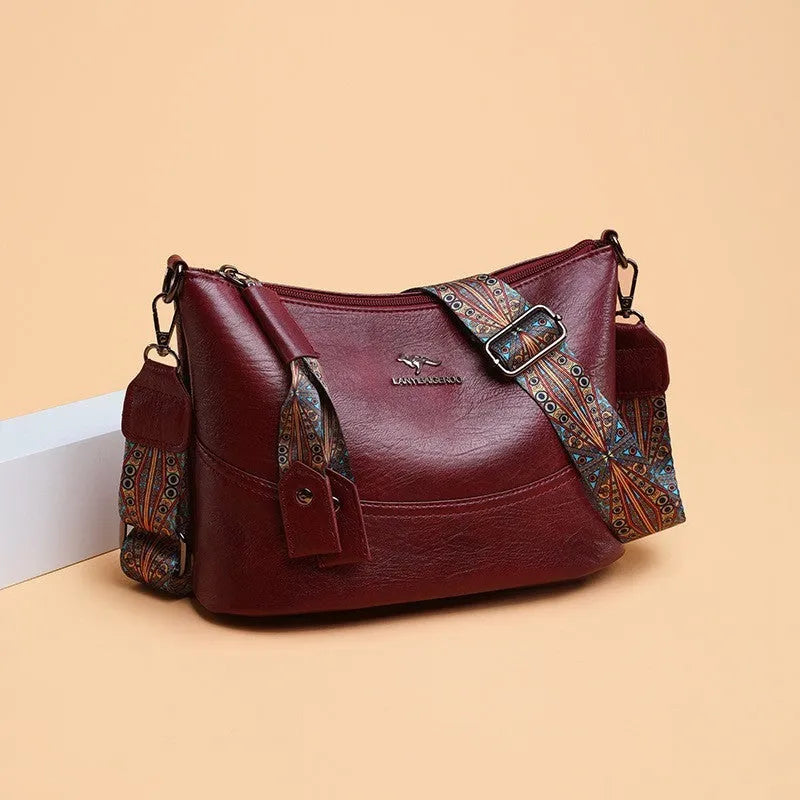 Women's bucket bag in PU leather, crossbody style, outer pocket, black colour, horizontal square shape