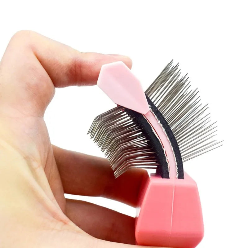 Blue double-sided pet brush with stainless steel pins on one side and a mix of soft and firm pins on the other.