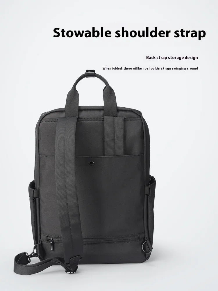 Lightweight black oxford cloth computer backpack with a 20-35 litre capacity.