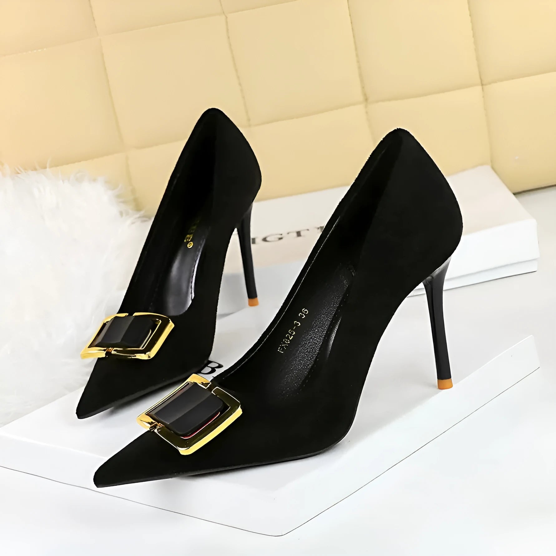 Black suede women's stiletto high heel shoes with a pointed toe and 9cm heel on a white background.