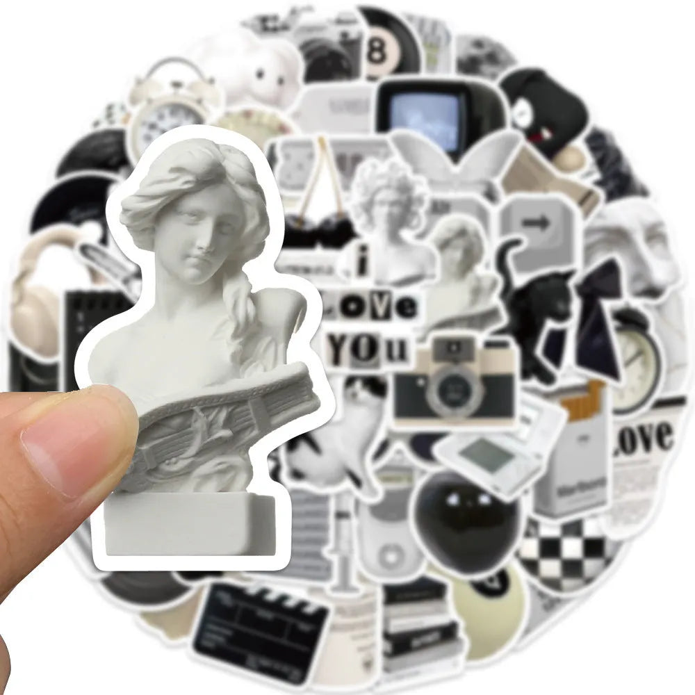 61 black and white PVC waterproof stickers for laptops, phones and multiple surfaces
