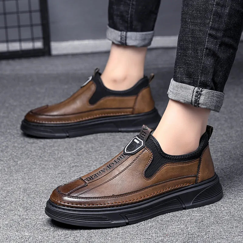 Men's casual leather shoes in solid black or brown with round toe design