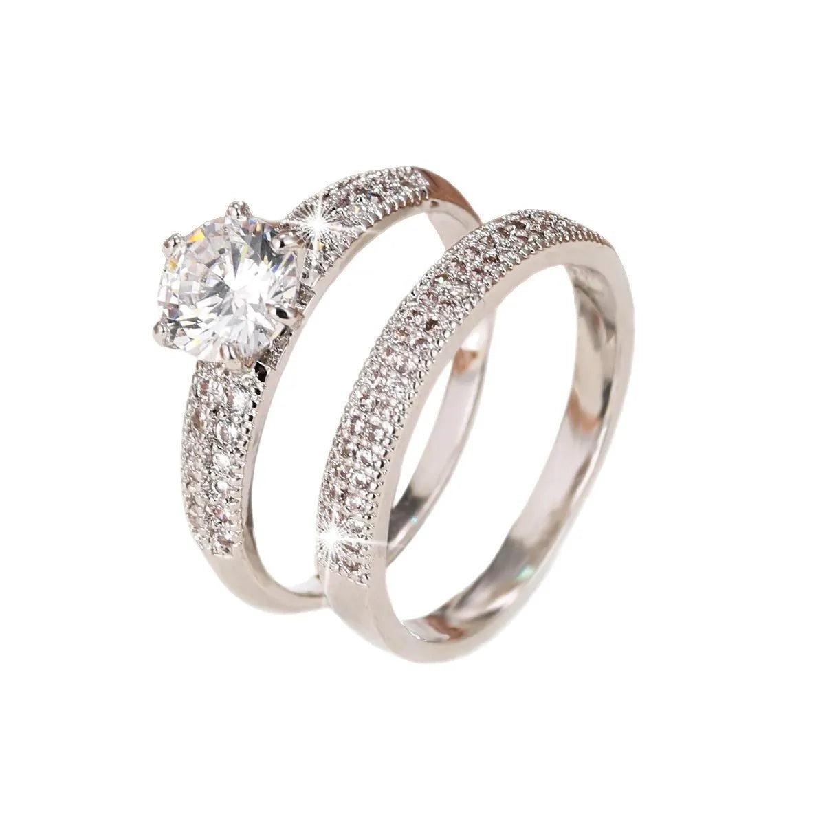 Two copper zircon hollow geometric rings with electroplated colour finish on white background