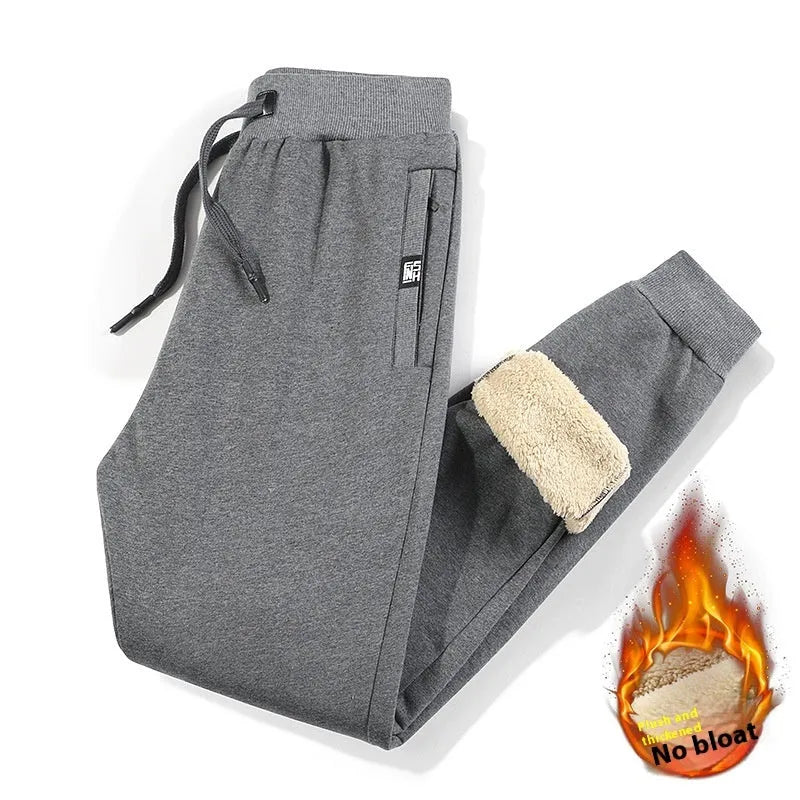 Men's gray fleece-lined oversized cotton track pants with a mid waist and straight leg