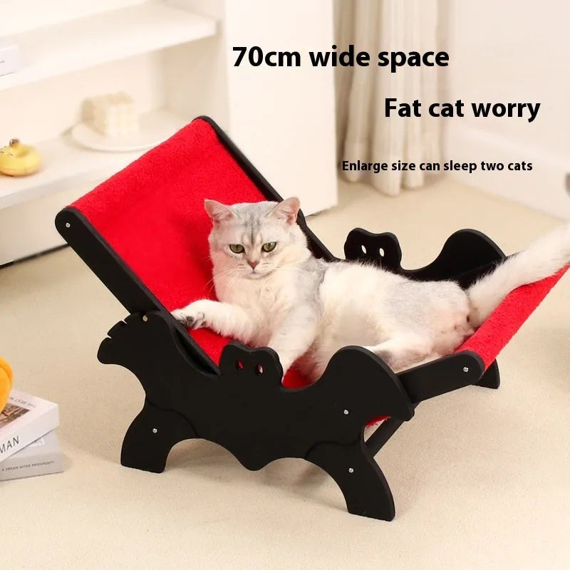 Black and red bat-shaped wooden cat recliner bed with Halloween theme