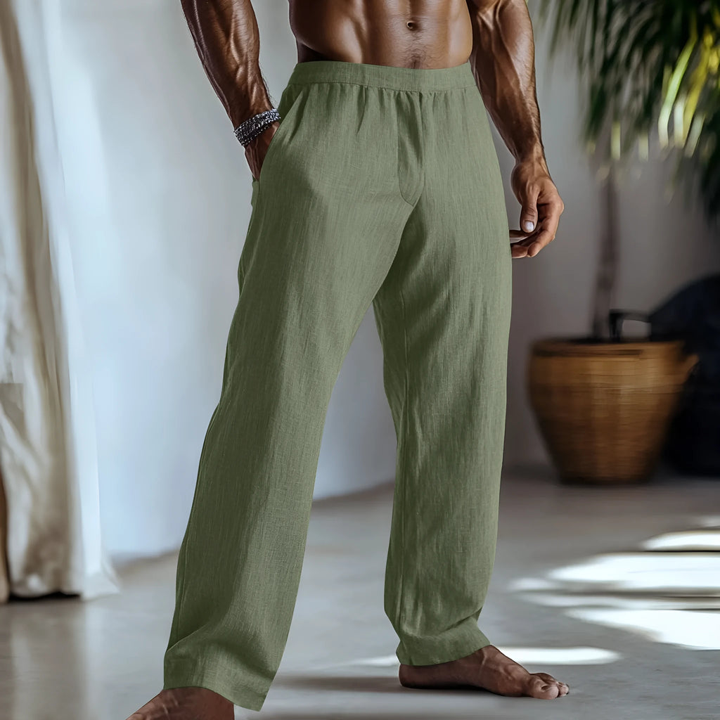 Cotton and linen straight-leg casual trousers in light green colour on a hanger