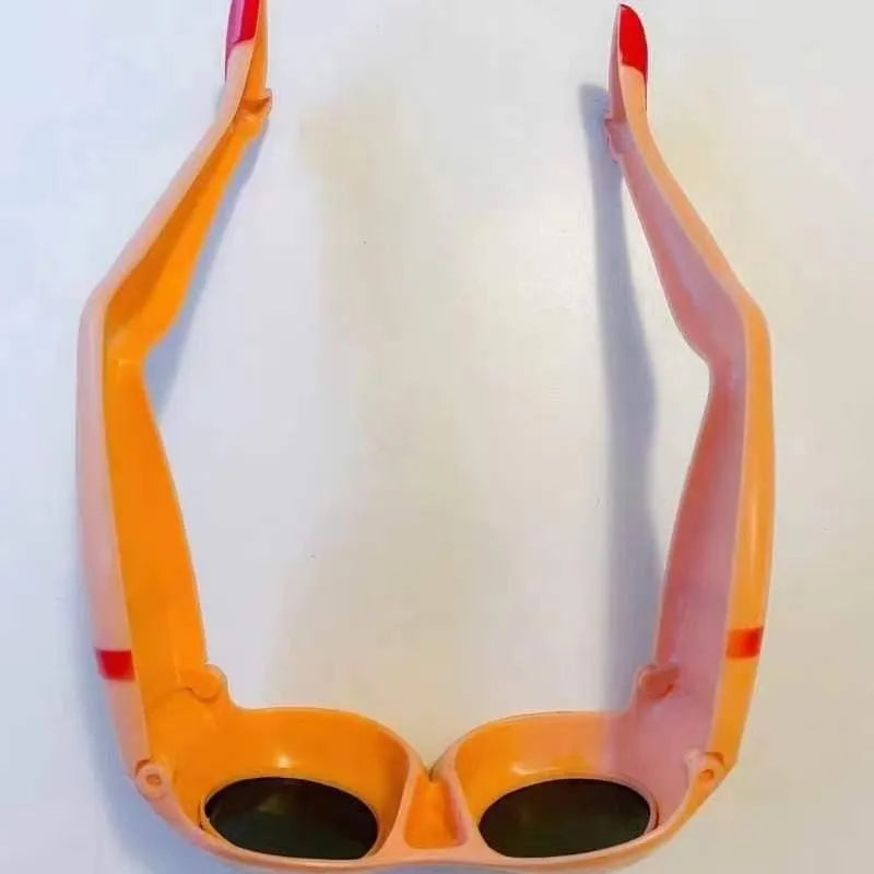 Orange novelty sunglasses with personality leg and hip design for adults