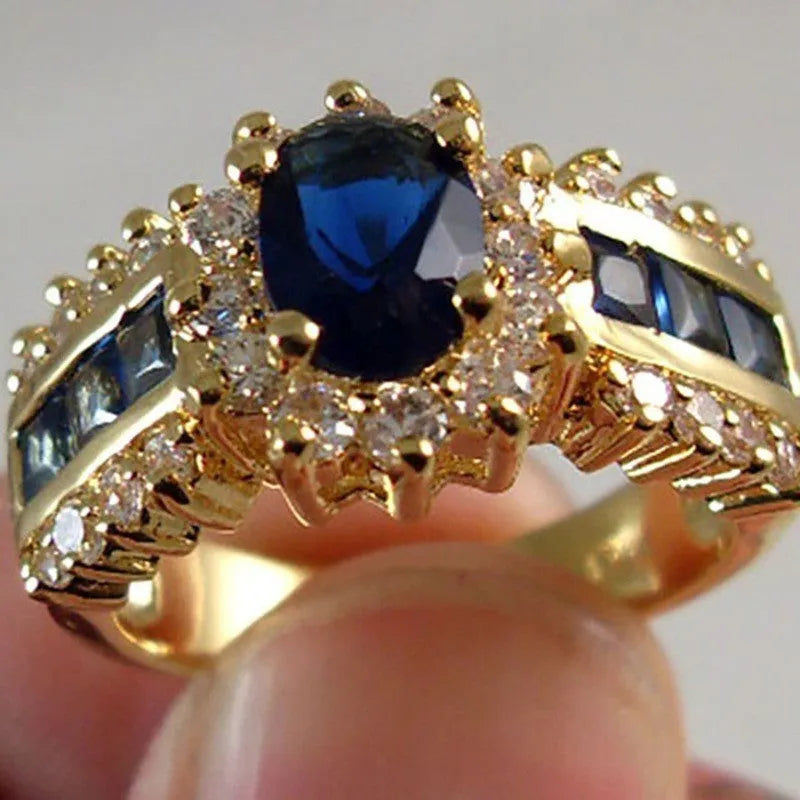 Zinc alloy fashion ring with diamond treatment in sunflower blue, square blue zircon, and square purple zircon style options.