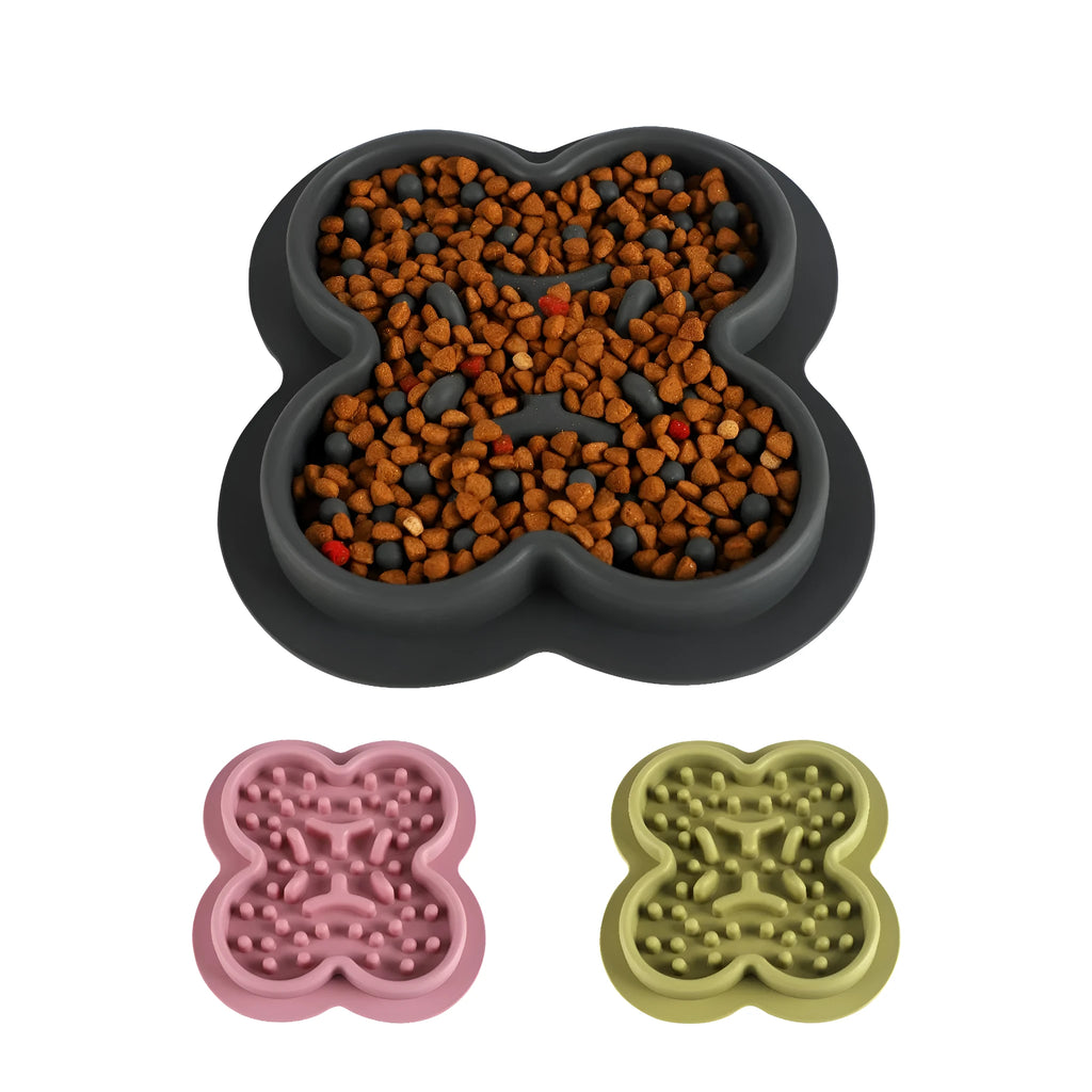 Silicone pet licking mat with textured surface and non-slip base in assorted colours.