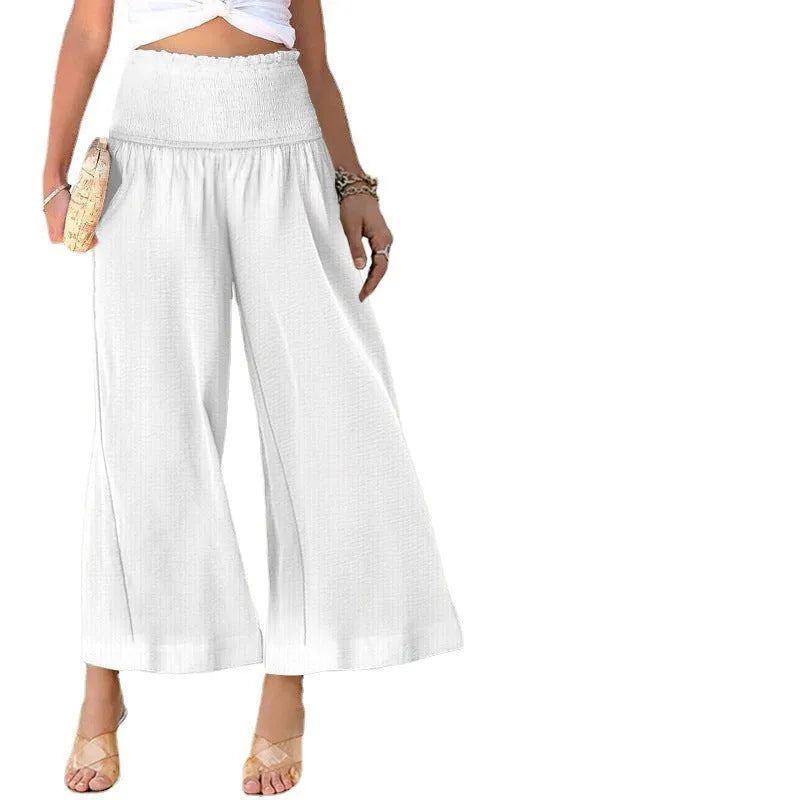 Women's high-waist cotton trousers in cropped straight-leg style with fold pleating detail