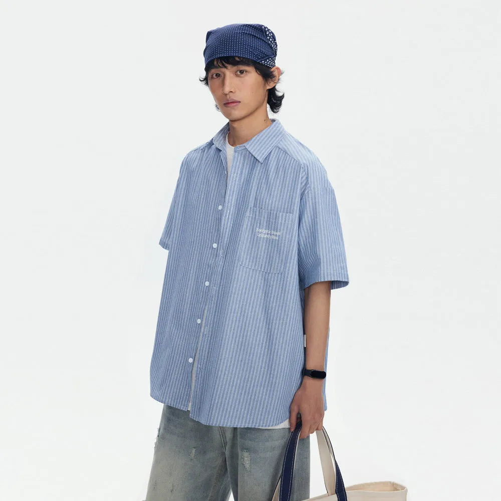 Blue striped overalls short-sleeved shirt for men and women, loose fit cardigan style, cotton blend fabric.