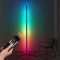 Black smart floor lamp with aluminium body and silicone shade, showing remote control