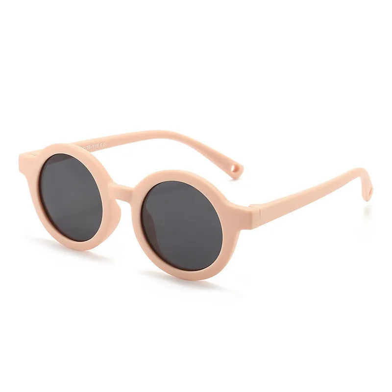Round frame polarised sunglasses for toddlers aged 0-3 years with UV400 protection, shown in multiple colour options.