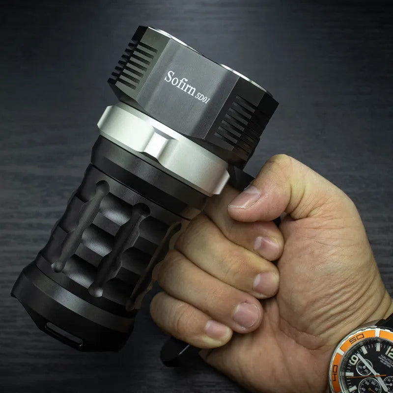 Aluminium alloy diving torch flashlight with 500m range and waterproof housing.