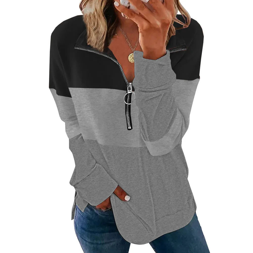 Women's loose long-sleeved leopard print polyester sweater on a hanger