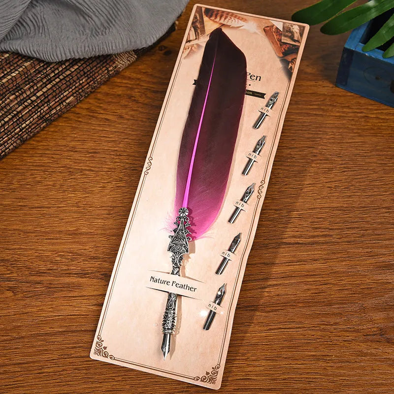 Vintage feather dip pen with zinc alloy shell in a choice of ten colours on a desk.