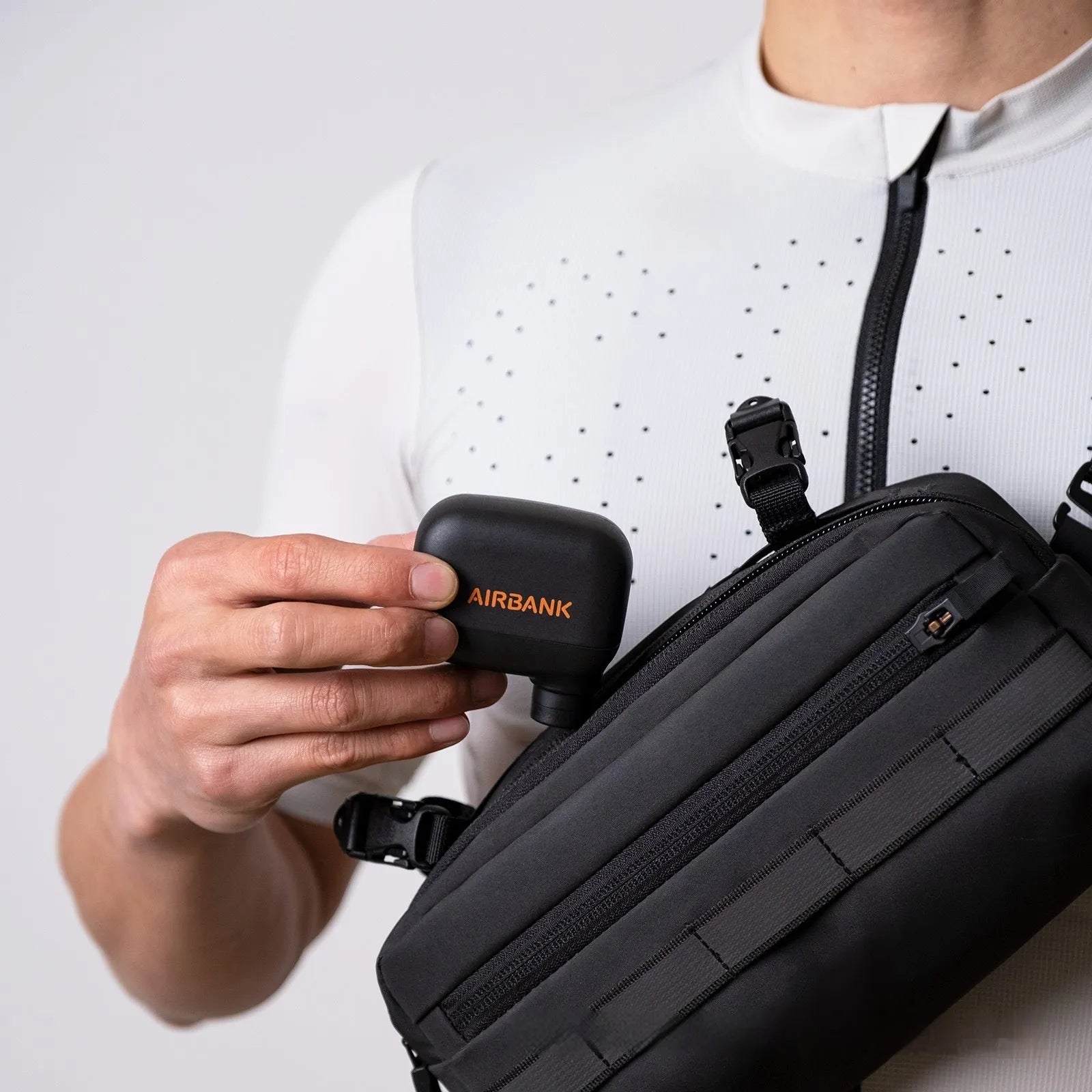 Black AS100 mini electric bike tyre pump with USB charging cable and waterproof storage bag